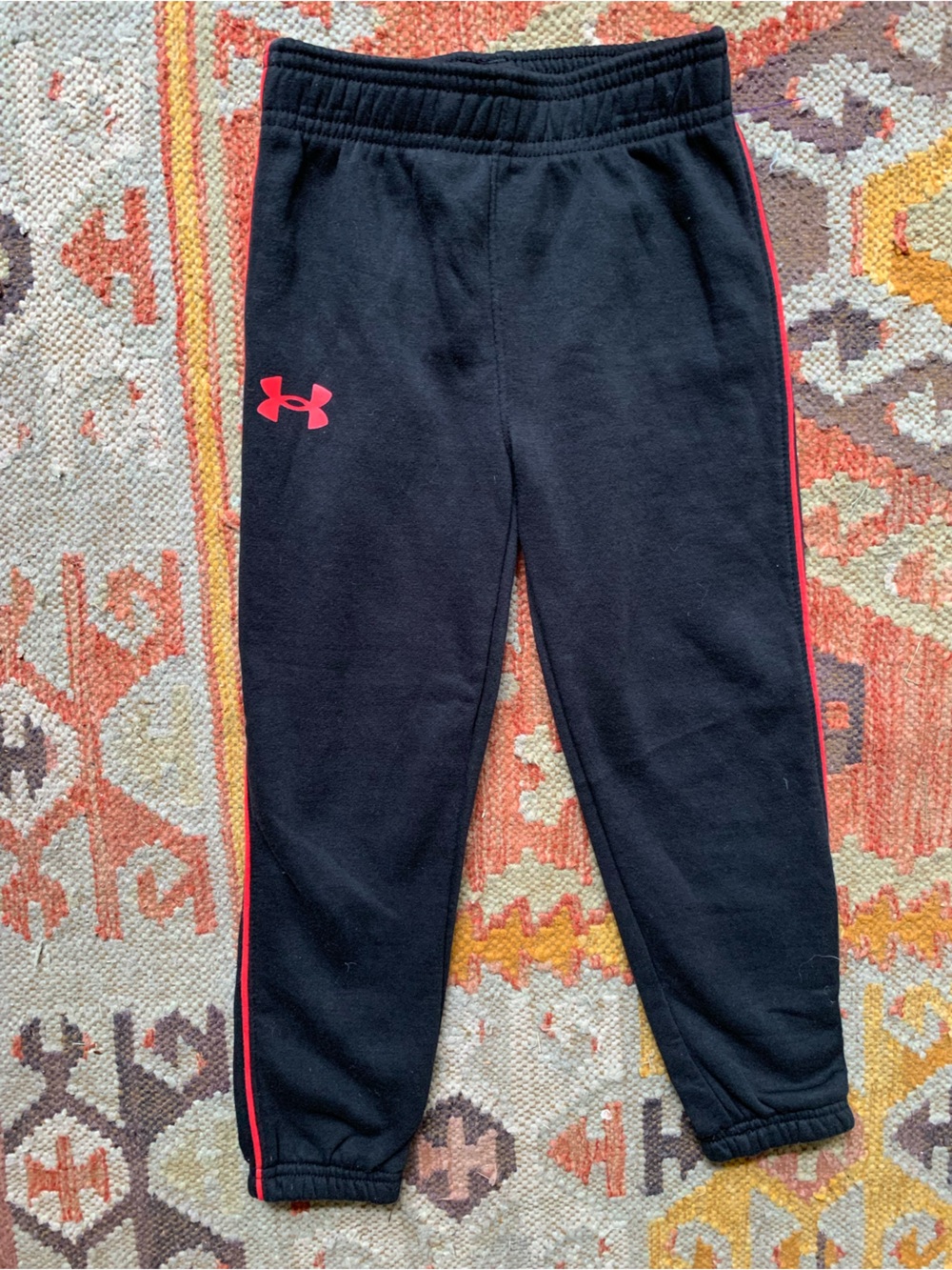 Under Armour Black Kids Joggers with Red Logo and Stripe